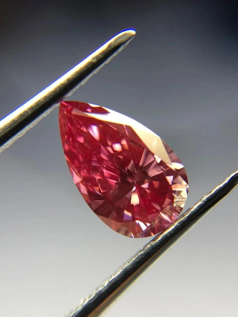 0.68Ct Pear Cut Vivid Pink Lab Grown Diamond